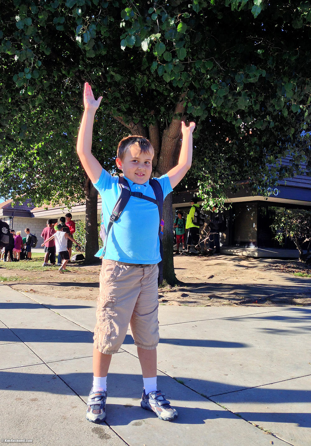 Ryan asked me to take his picture holding up the tree.