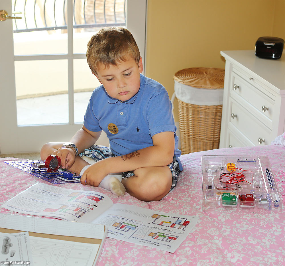 Ryan plays with his Snap Circuits