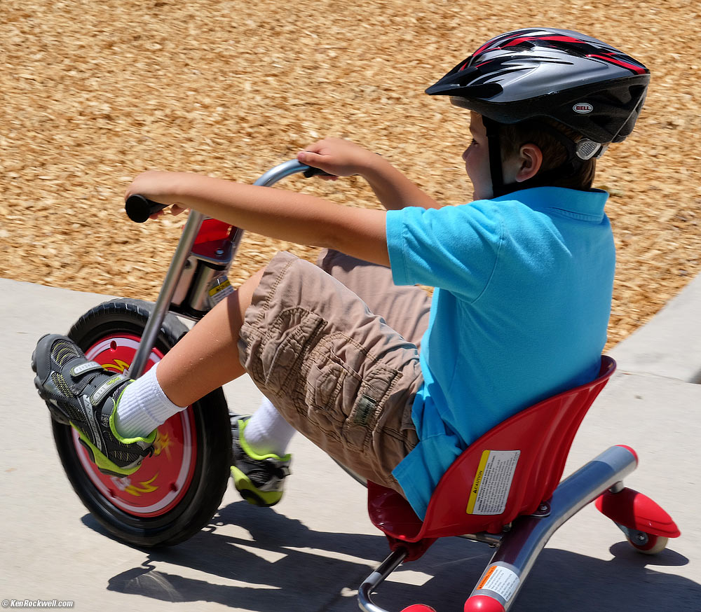 Ryan and his Razor 360 FlashRider sparking tricycle