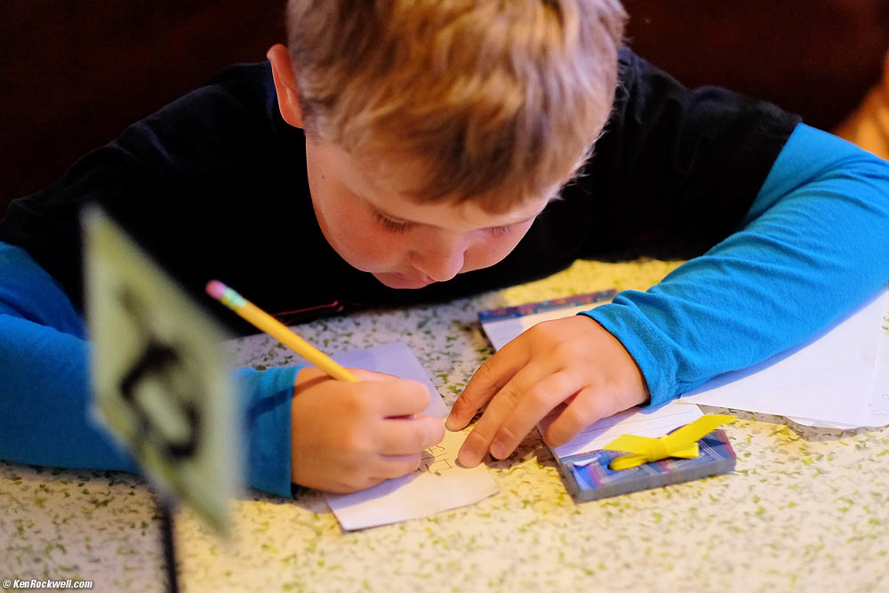 Ryan writing a text message to Katie