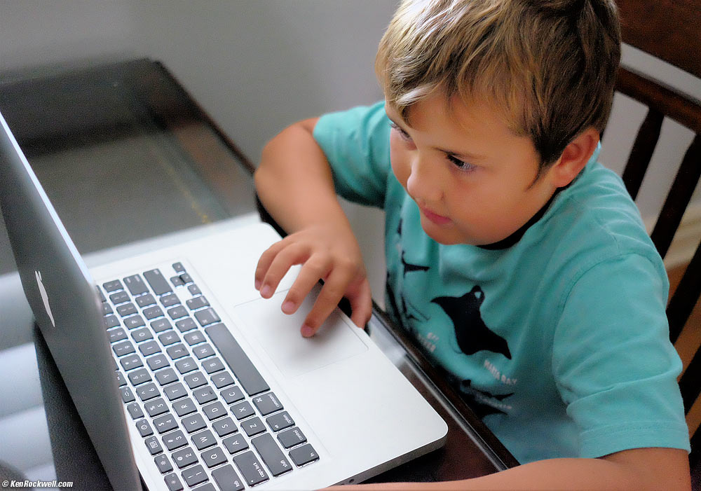 Ryan playing on Dad's 13" MacBook Pro