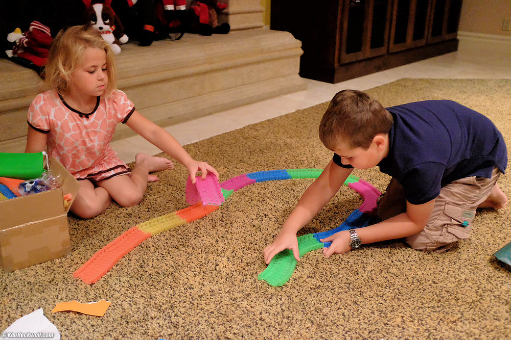 Ryan builds the car tracks he got from Grandma Rockwell