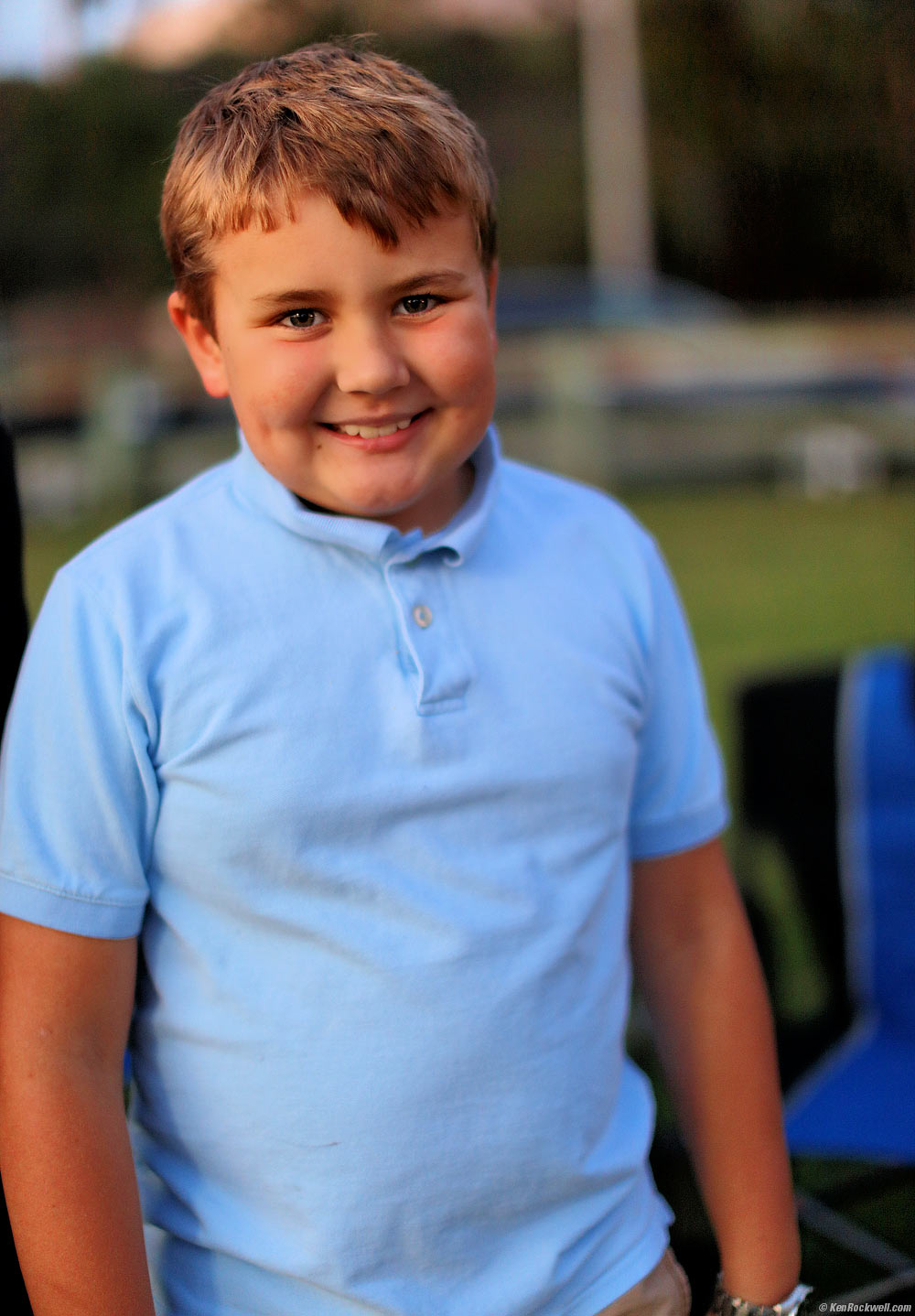 Ryan smiles in the dark at the park