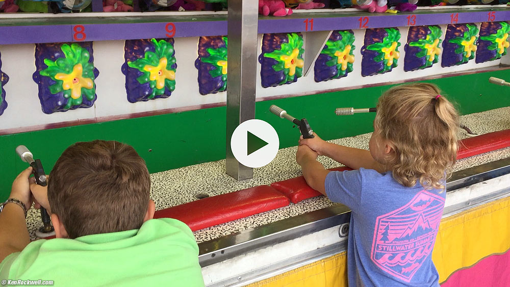 Ryan and Katie shoot the water guns