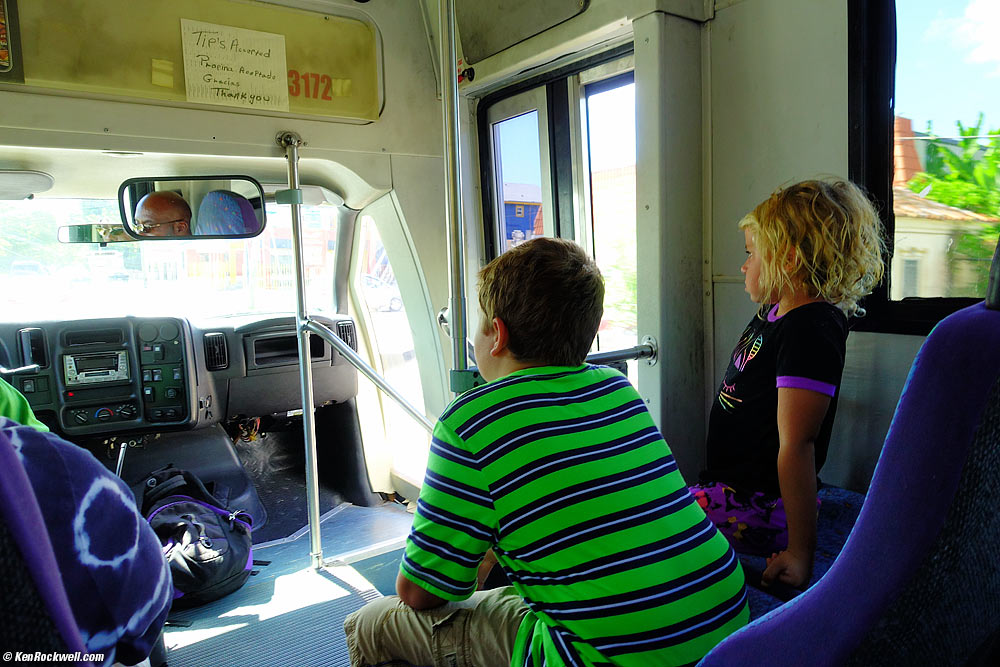 Kids on shuttle bus to the resort