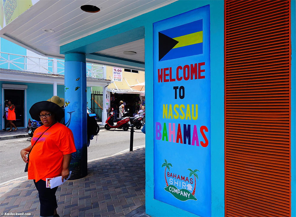 Colorful lady in red, Nassau, Bahamas