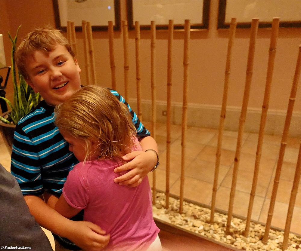 Kids hugging on the way in to the buffet