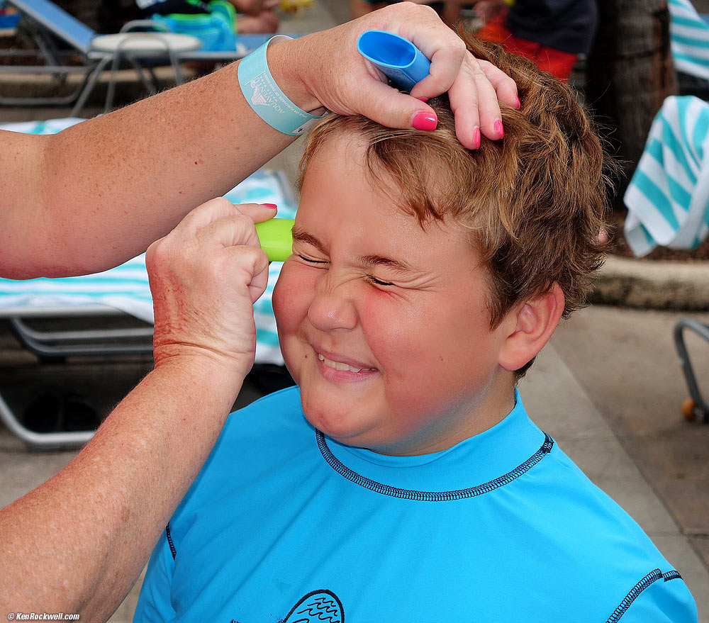 Ryan gets suntan stick on his face