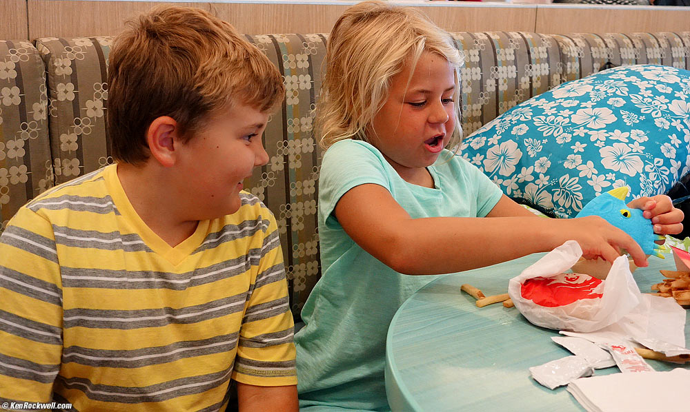 Kids playing with a toy from Wendy's at the Nassau, Bahamas airport (NAS)