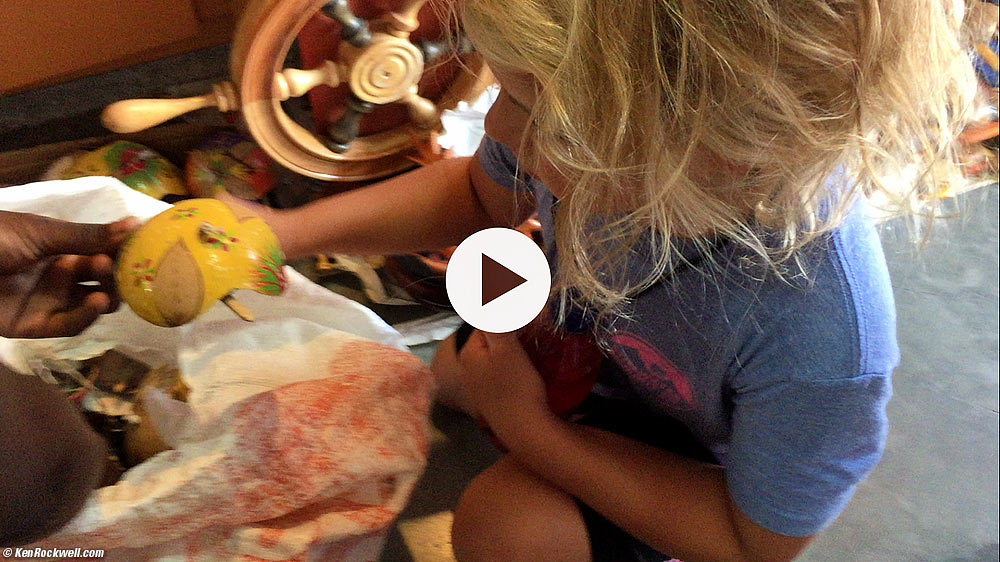 Katie shops for turtles at the Straw Market.