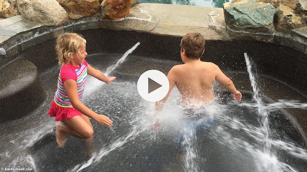 Kids playing in the jets of an empty spa