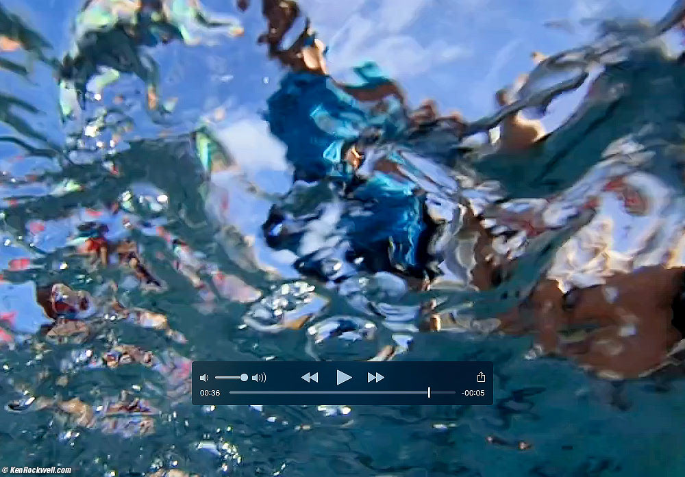 Dad chases the kids down the water slide