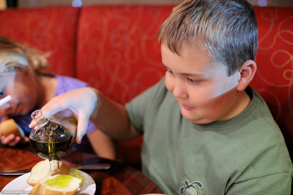 Ryan tries the crazy oil and vineger holder at Empanada Tuesday