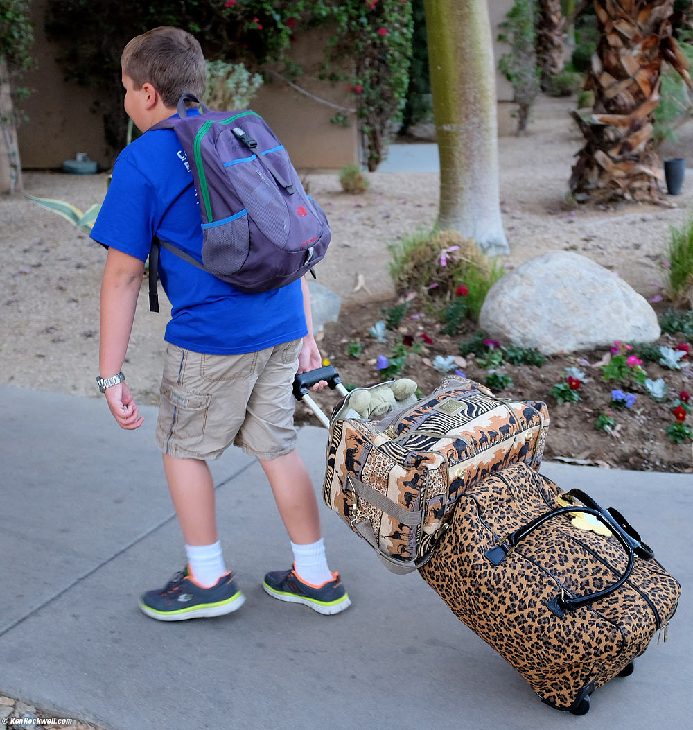 Ryan carries in the luggage