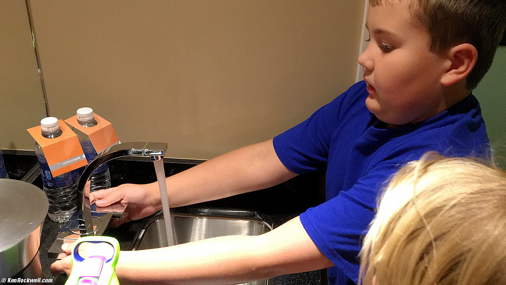 Ryan checks out the faucets with Katie