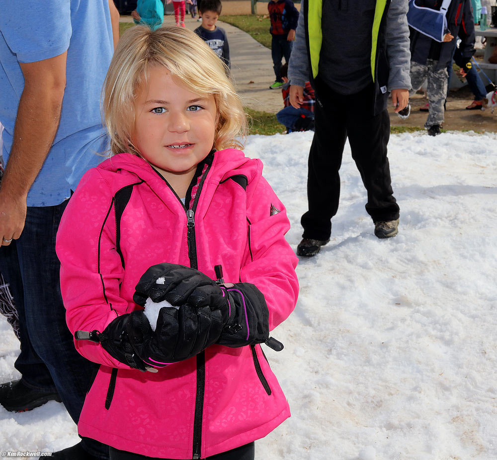 Katie and the snowball Ryan made for her.