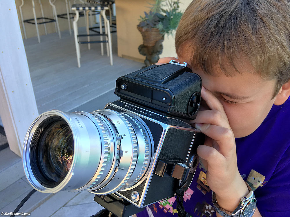 Ryan and the Hasselblad 500 C/M with PME finder and Zeiss Sonnar 150mm f/4 C. 