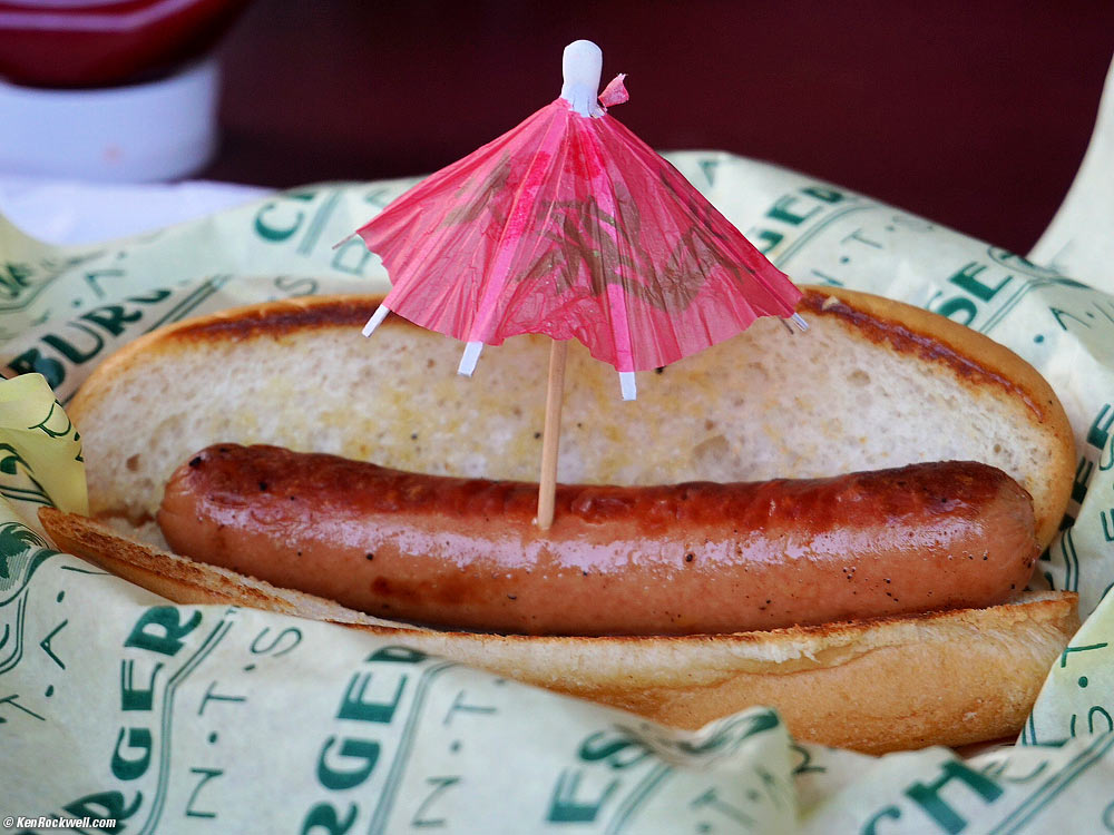 Ryan and Dad by the giant Willie Nelson guitar at Charley's Restaurant and Saloon, Paia, Maui