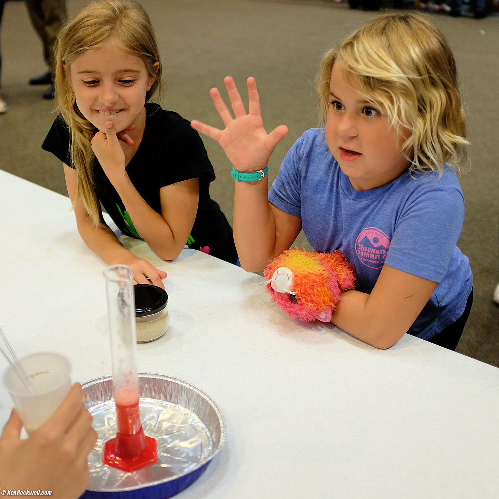 Katie and best friend Alyssa watching science
