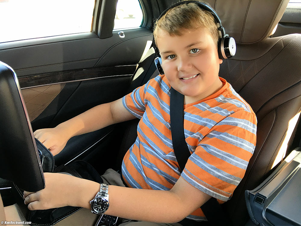 Ryan in the back of a 2014 Mercedes S550