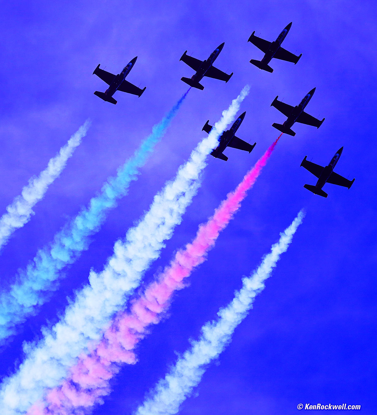 Red, White and Blue Smoke Behind Jet Planes