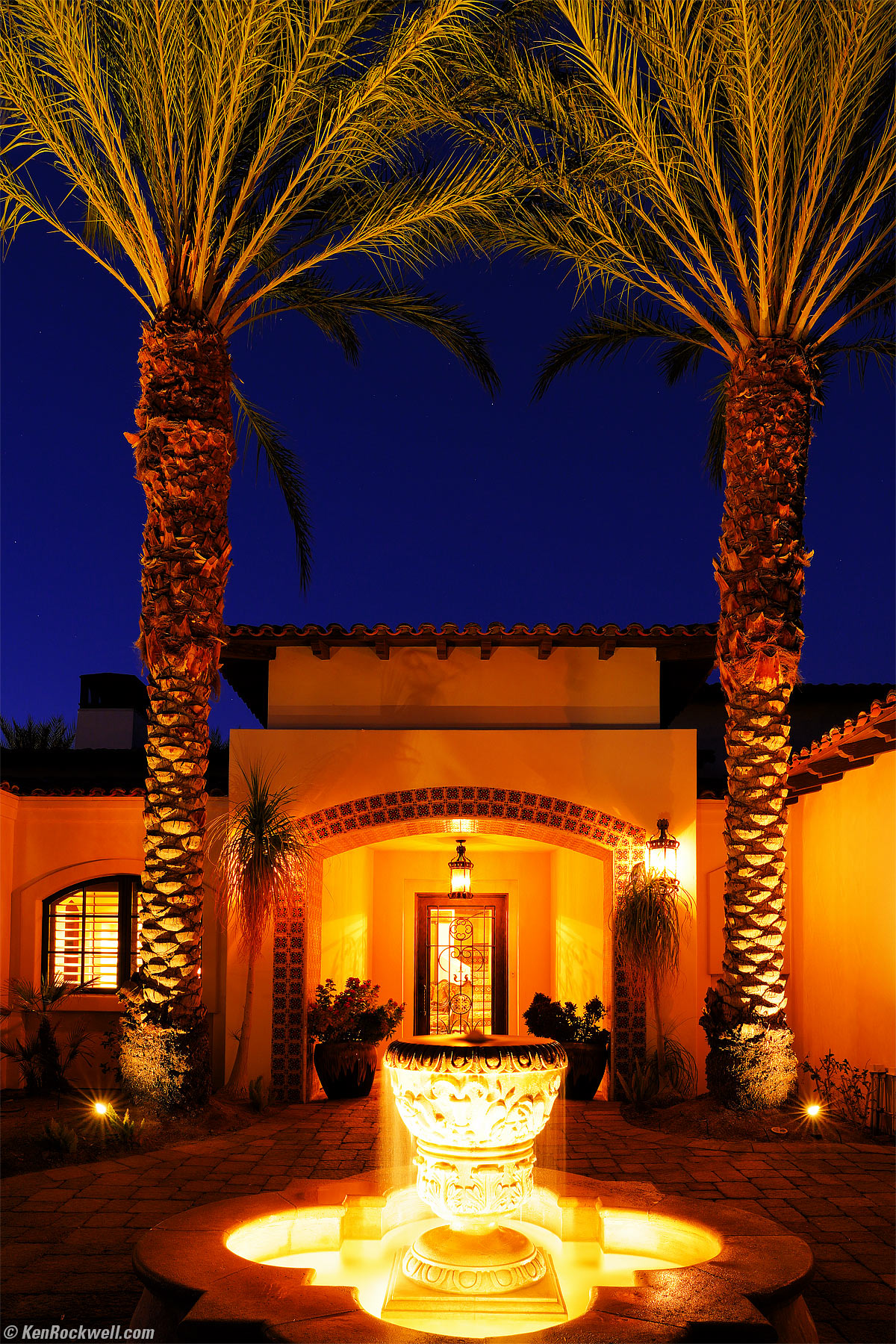 Desert Home with Twin Palms at Dusk