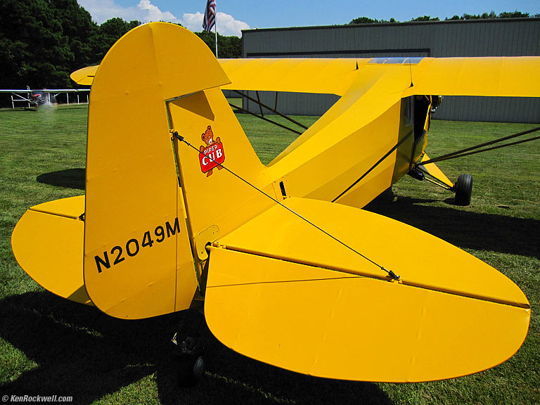 Piper Cub Tail, Bayport Aerodrome, Long Island, New York, 12:34 PM.