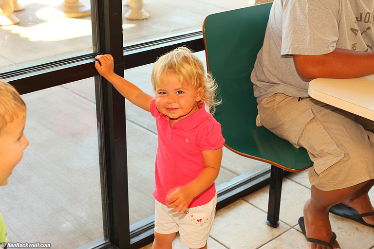 Ryan and Katie smiling, L&L Drive-Inn, Kihei, Maui. 10:29 AM.
