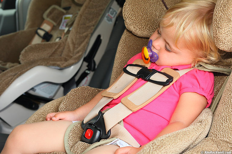 Katie asleep as we got to Costco, Maui. 12:01 PM.