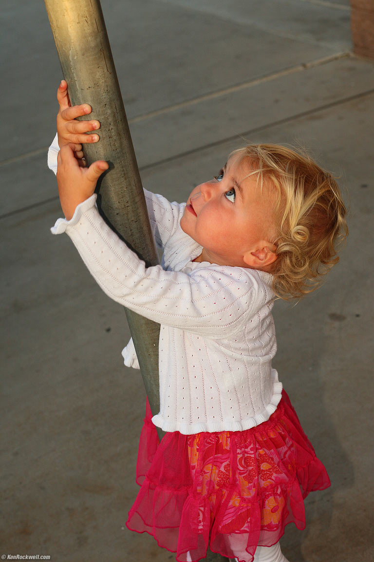 Katie climbs up the pole, Kihei, Maui. 6:34 PM.