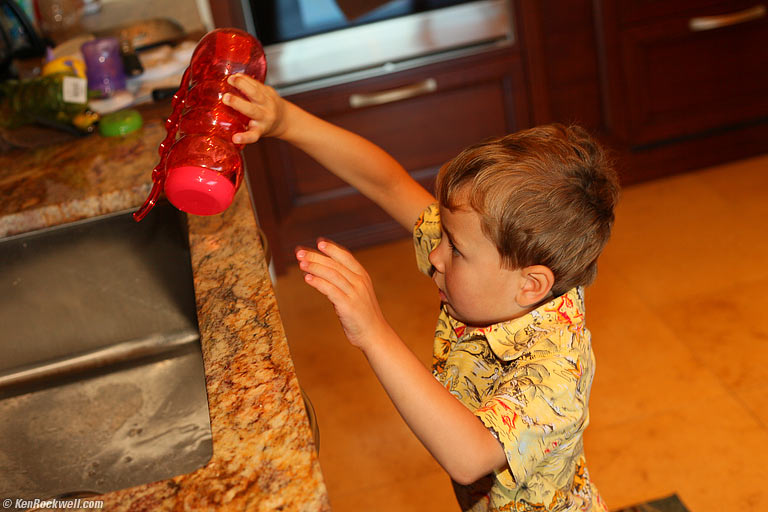 Ryan emptying his silly straw cup, Wailea, Maui. 8:21 AM.