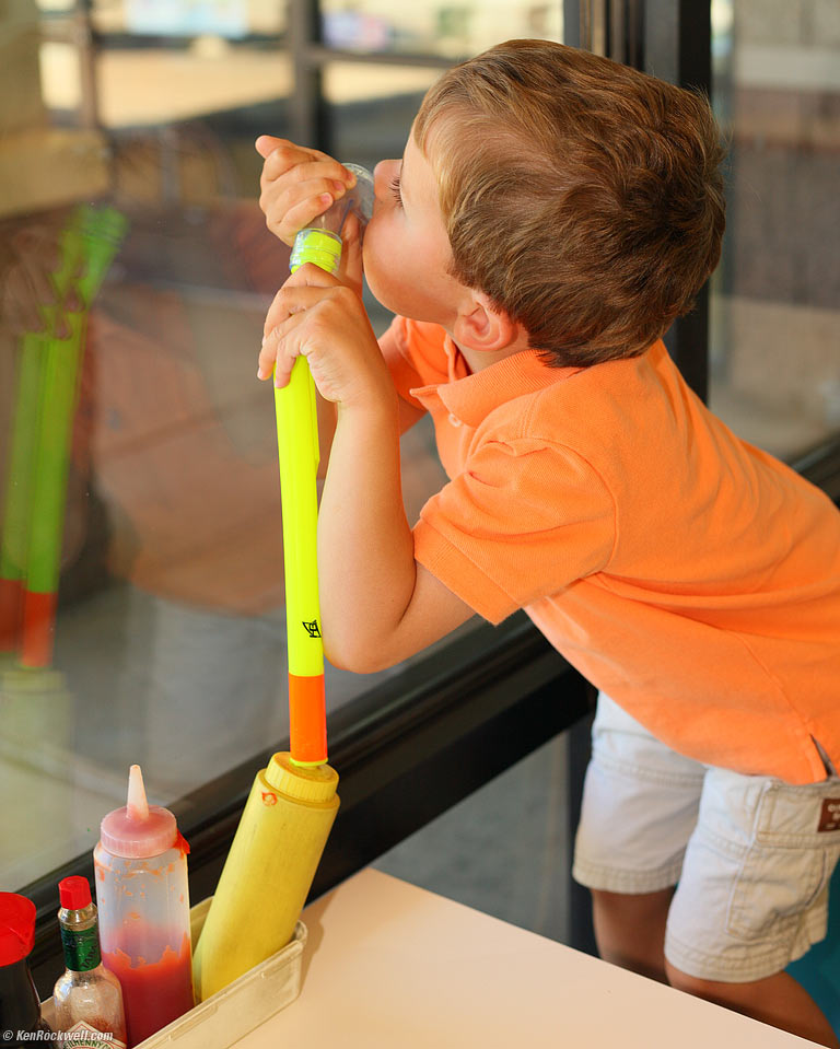 Sucking mustard, L&L Drive-Inn, Kihei, Maui. 10:12 AM.