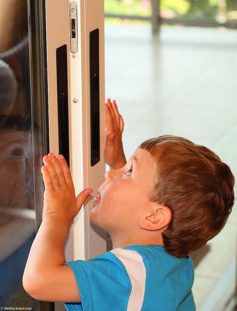 Ryan checking out the sliding doors, Wailea, Maui. 10:00 AM.