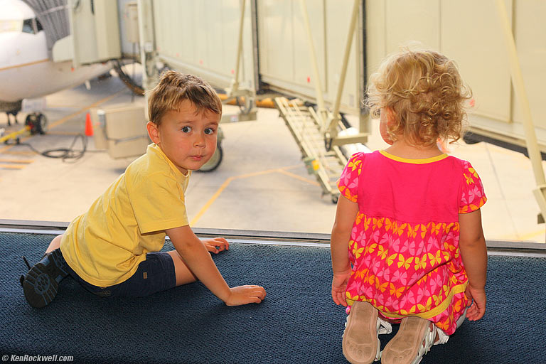 Looking out the window, Honolulu Airport. 11:57 AM.