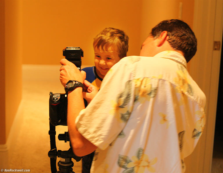 Dad adds the SB-600 flash to the D3, 9:33 AM.