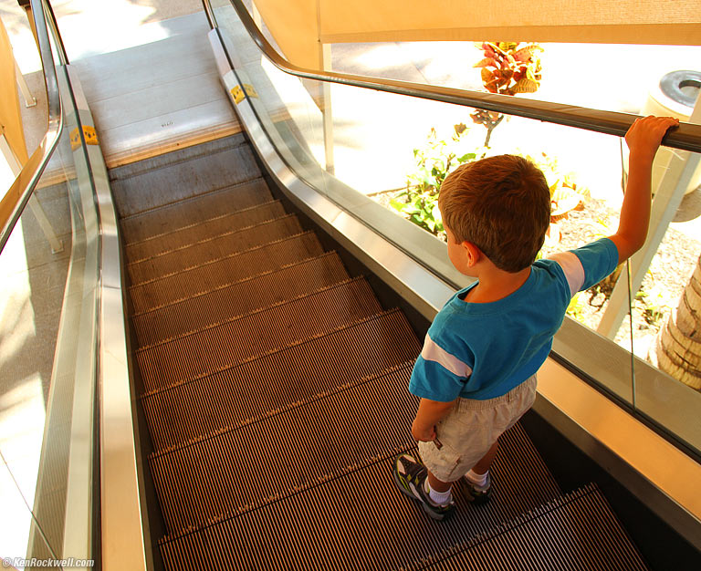 Ryan rides the escalaotpr &mdash; about 100 times, 11:47 AM.