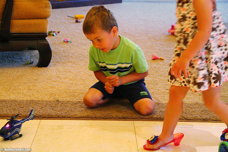 Ryan and helicopter, Katie andfancy baby clothes, 6:57 PM.