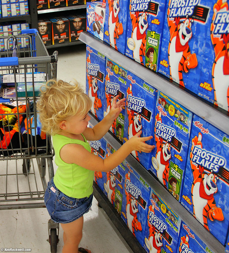 Katie grabs the Frosted Flakes, 11:55 AM.