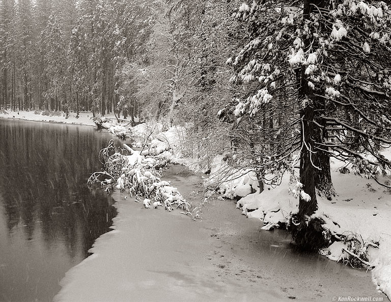 Riverbank in Snow Flurries
