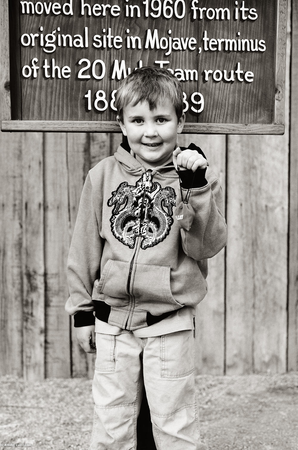 Ryan outside the Borax Museum holding his new magnetic hematite rocks gotten inside, Furnace Creek Ranch, Death Valley, California 2:30 PM