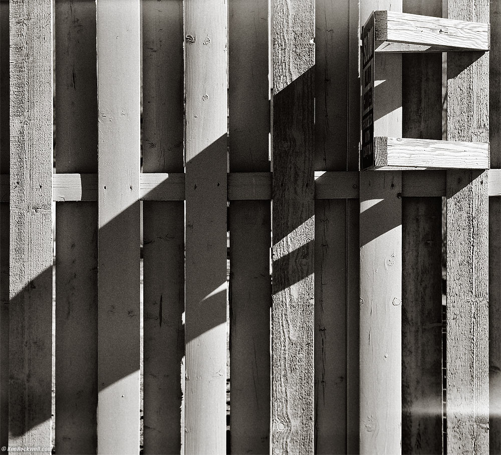 Fence outside the restrooms near employee housing, Furnace Creek Ranch, Death Valley, California 12:57 PM