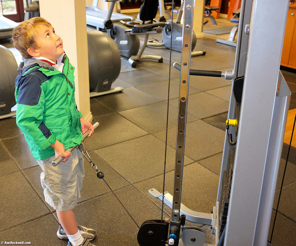 Ryan on the weight machine, 12:13 PM.
