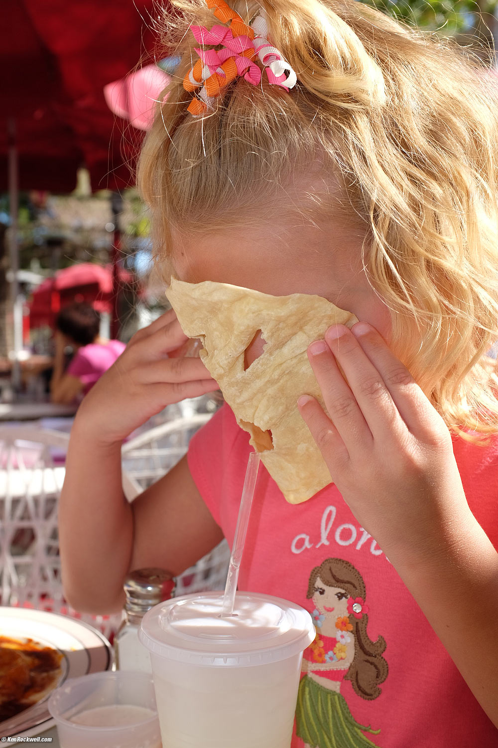 Katie Drinks Through Her Tortilla Mask