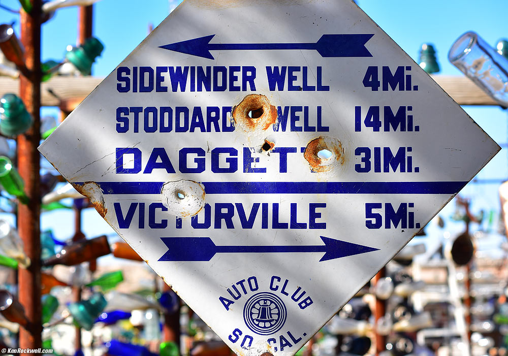 Morning Light on Old Porcelain AAA Road Sign at the Bottle House, Route 66