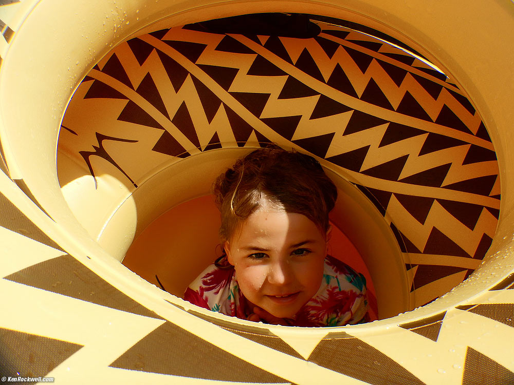 Katie in a pile of inner tubes