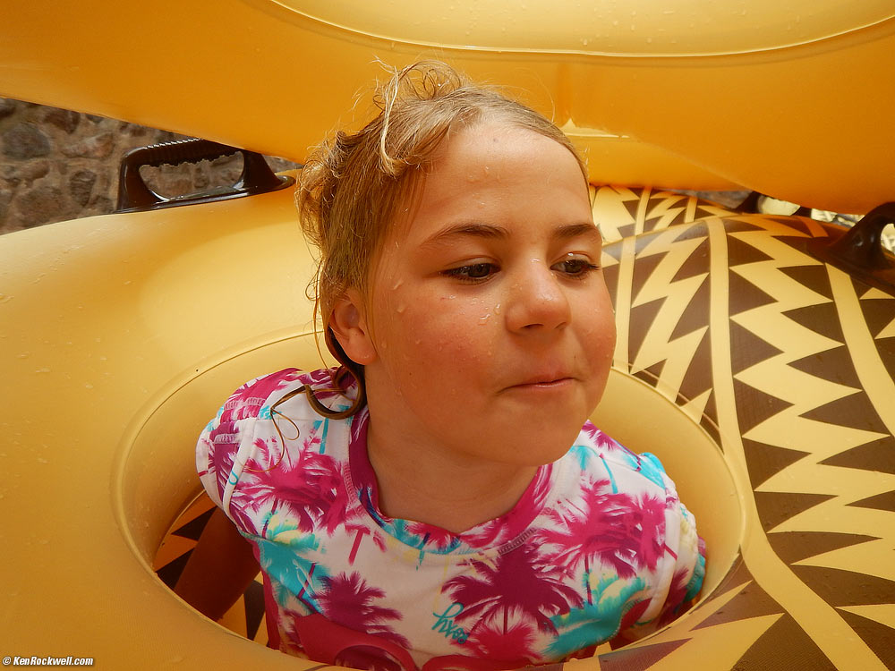 Katie in a pile of inner tubes