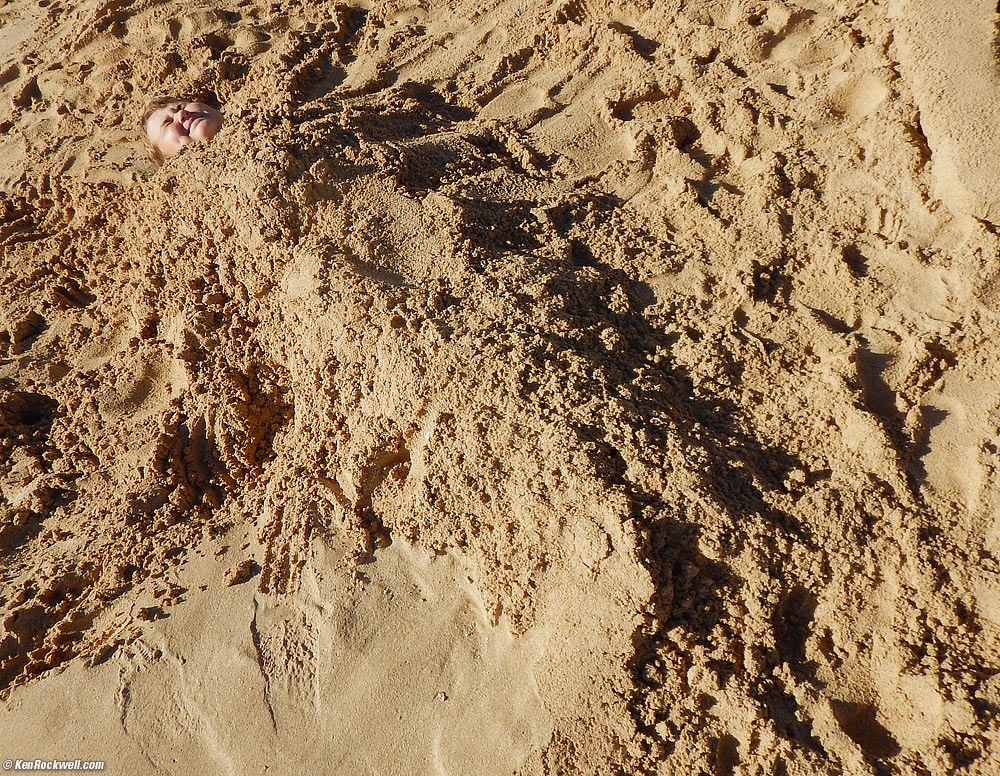 Ryan buried in the sand